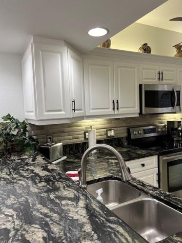 2389 Hidden Lake Ct, Naples, FL 34112-2720
