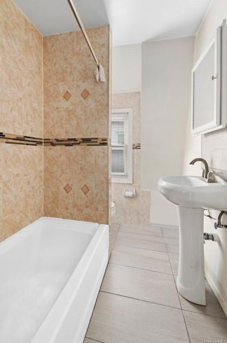 221-13 91st Rd, Jamaica NY  11421-2723 exterior