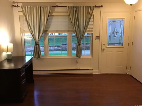 401 Woodbridge Dr, Panamoka, NY 11961-1147