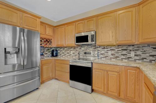 771 Gazetta Way, West Palm Beach, FL 33413-1058