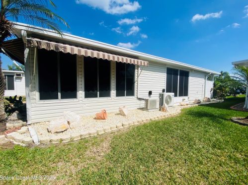 135 Windsong Way, Titusville FL  32780-2328 exterior