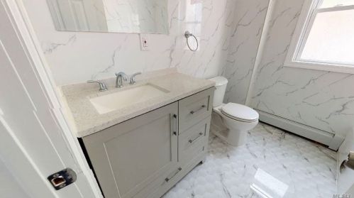 12 Roosevelt Ave, Roosevelt, NY 11575-1117