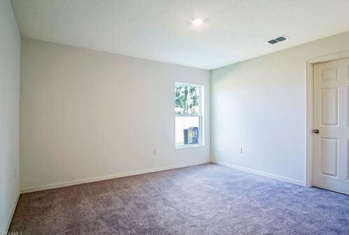 426 Piedmont St, Lehigh Acres FL 33974-2801 exterior