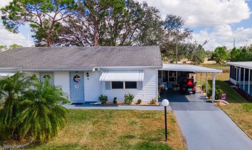 12 Heath Aster Ln, Lehigh Acres FL 33936-7347 exterior