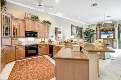 8783 Muirfield Dr, Naples FL 34109-4352 exterior