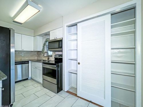 279 Rosewood Ct, Lehigh Acres FL  33936-1448 exterior