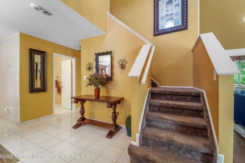 8 Enclosure Dr, Morganville, NJ 07751-1808