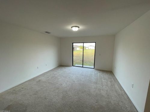 128 Shadow Lakes Dr, Lehigh Acres FL  33974-0803 exterior