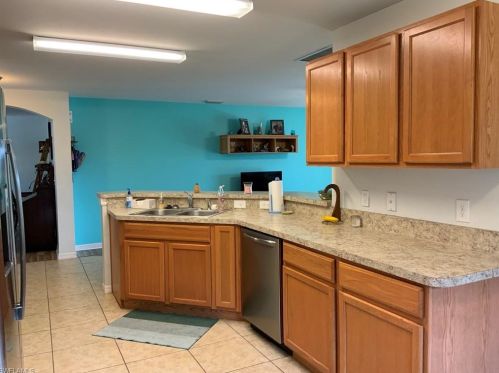 382 Shadow Lakes Dr, Lehigh Acres FL  33974-0807 exterior