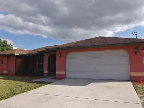 402 4th St, Lehigh Acres, FL 33936-1451
