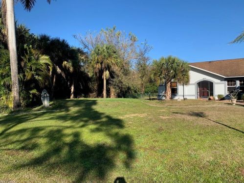 414 Palmetto Ave, Lehigh Acres FL 33972-7859 exterior