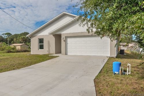 5780 Palm St, Mims, FL 32754-6909