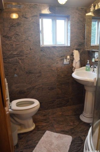 355 Heathcote Rd, North Lindenhurst NY  11757-1744 exterior