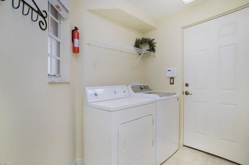 8599 Ibis Cove Cir, Naples FL  34119-7746 exterior