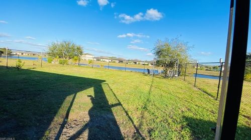 354 Shadow Lk Dr, Lehigh Acres FL 33974-0826 exterior