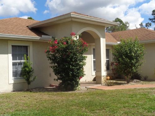 1137 Dutchess St, Lehigh Acres FL 33974-4754 exterior