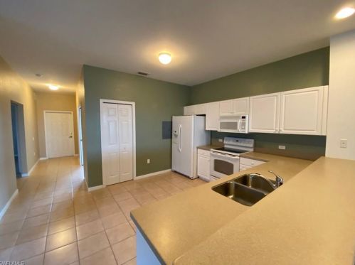 10036 Heather Ln, Naples, FL 34119-9025