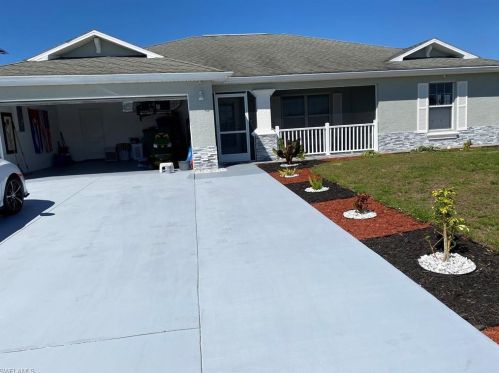 145 Peerless St, Lehigh Acres, FL 33974-9456