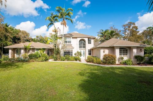 15995 Meadow Wood Dr, West Palm Beach, FL 33414-9027