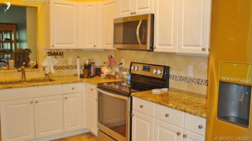 3886 Whispering Sound Dr, Palm City, FL 34990-7759