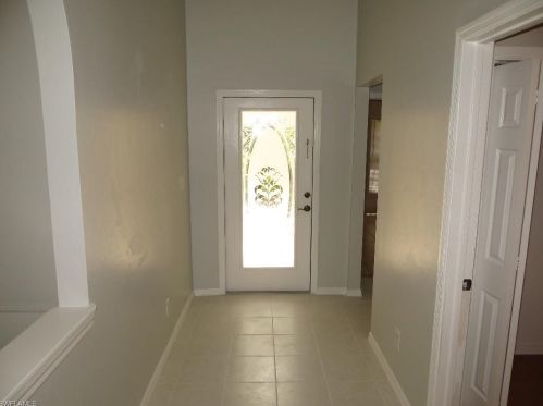 2224 Heritage Greens Dr, Naples FL  34119-3310 exterior