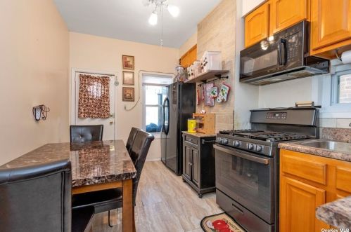 90-16 97th Ave, Jamaica, NY 11416-1022