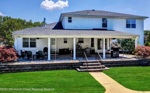 142 Serpentine Dr, Morganville NJ  07751-1400 exterior