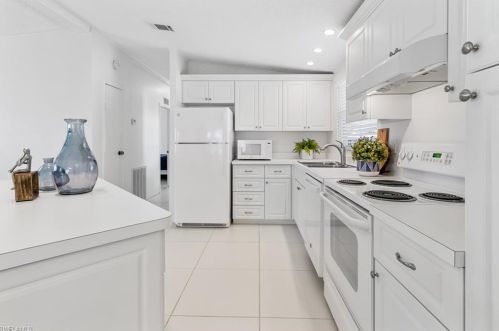 617 Charlemagne Blvd, Naples FL  34112-7048 exterior