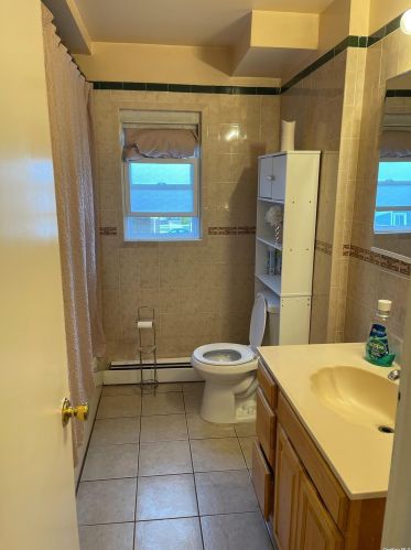 160 Roquette Ave, Floral Park, NY 11003-1209