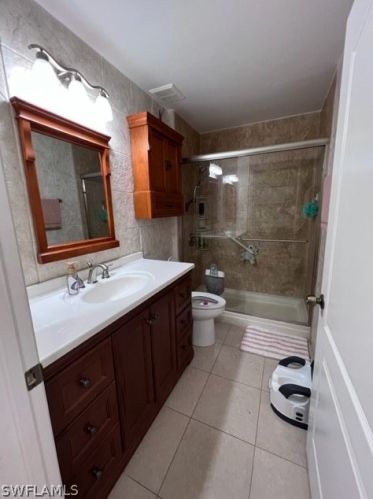 1041 Cedartree Ave, Lehigh Acres FL 33971-7590 exterior