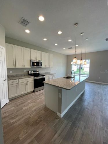 679 Basingstoke Ct, Kissimmee FL  34758-4201 exterior