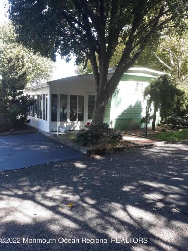 20 Village Rd, Morganville, NJ 07751-1100