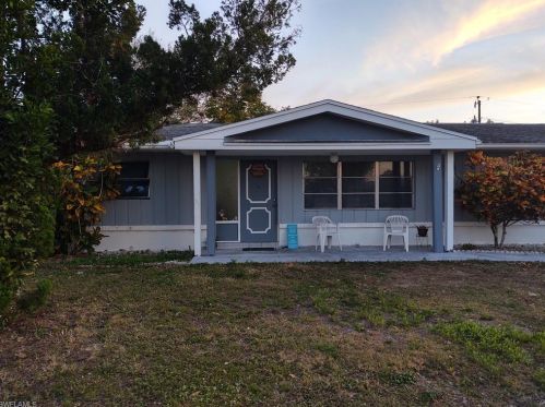 215 Fireside Ct, Lehigh Acres, FL 33936-7003