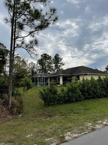 711 Almelia St, Lehigh Acres, FL 33974-4731