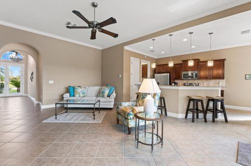 9463 Quarry Dr, Naples FL  34120-5223 exterior