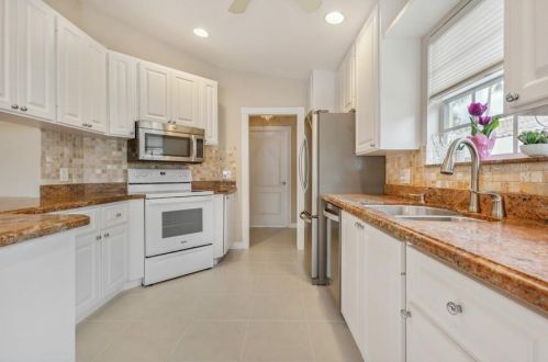 7718 Pine Island Way, West Palm Beach FL  33411-5802 exterior