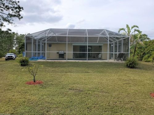 507 Aspen Ave, Lehigh Acres FL 33974-9613 exterior