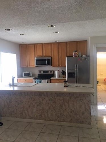 1202 Sun Terrace Ct, West Palm Beach, FL 33403-1192