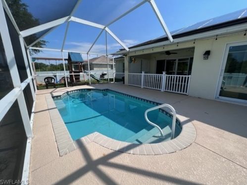 1041 Cedartree Ave, Lehigh Acres FL 33971-7590 exterior