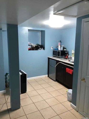 93 Henry St, Roosevelt NY  11575-1304 exterior