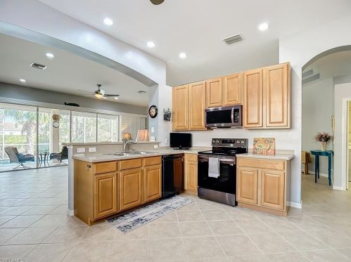 5690 Lago Villaggio Way, Naples FL  34104-5739 exterior