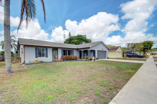 1123 Widgeon Rd, West Palm Beach, FL 33414-5050