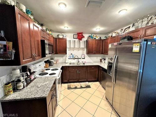 102 Oleander Rd, Lehigh Acres, FL 33936-6239