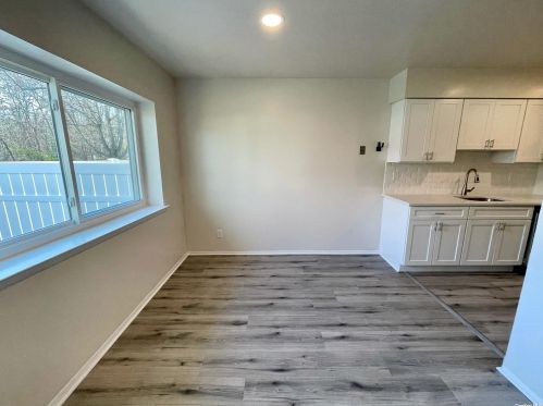 63 Storm Dr, Holtsville NY  11742-1909 exterior