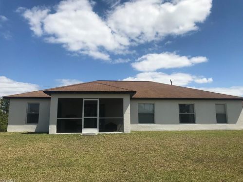 320 Lancelot Ave, Lehigh Acres, FL 33974-9734