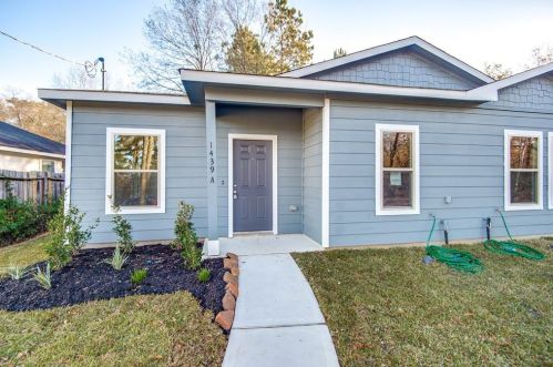 1439 Rustling Oaks, Conroe, TX 77301-4447