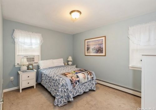 54 Scenic Hills Dr, Panamoka NY  11961-3024 exterior