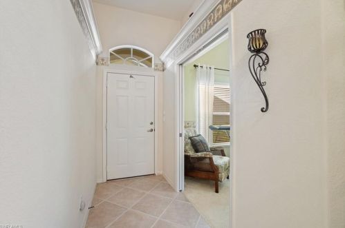 8491 Ibis Cove Cir, Naples, FL 34119-7744