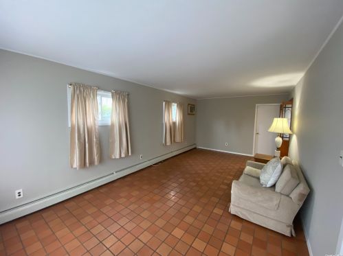 94 Pilgrim Ln, Westbury, NY 11590-6219