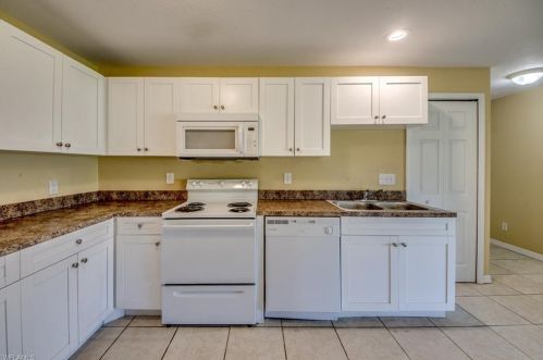 217 Ivan Ave, Lehigh Acres FL 33973-2011 exterior